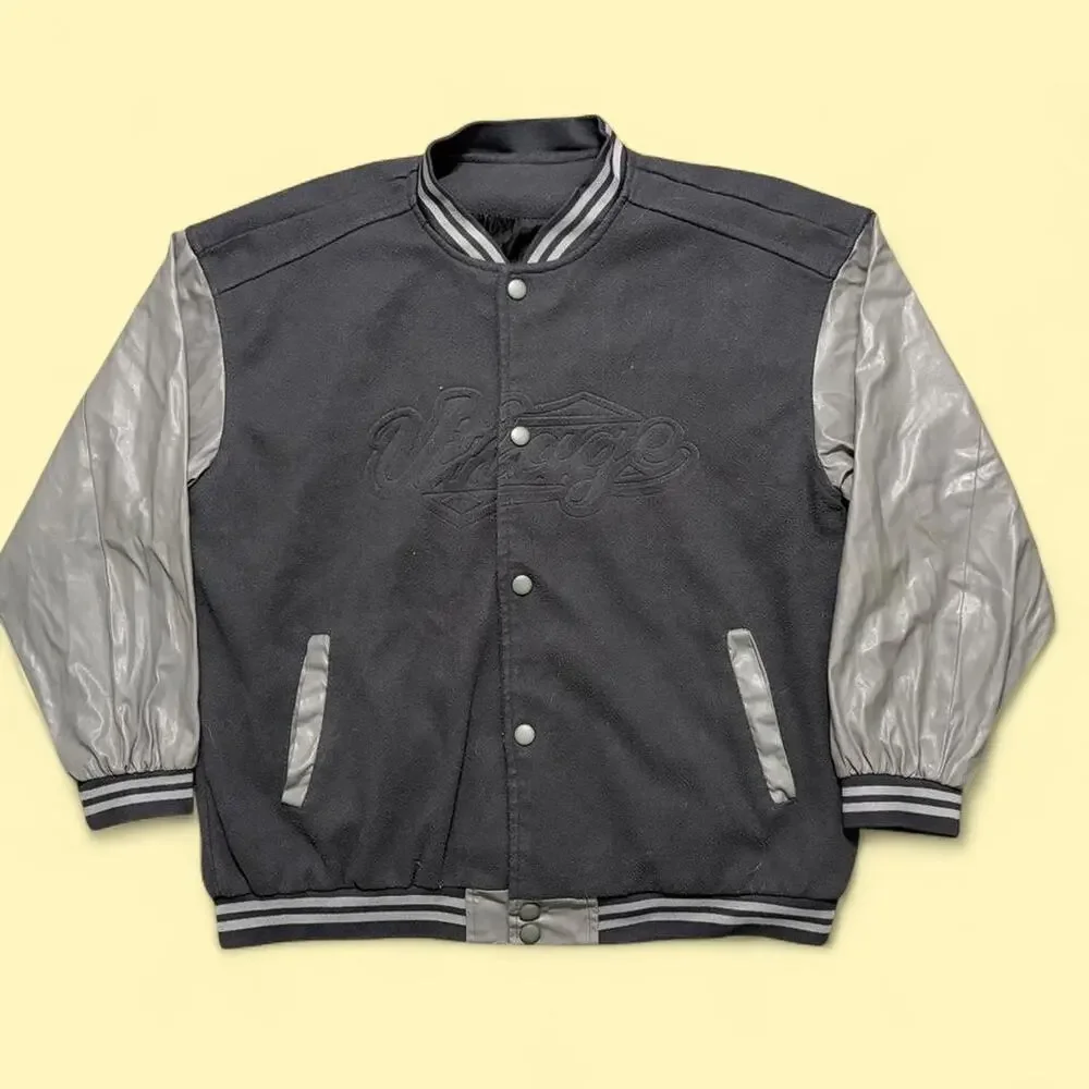 Black varsity jacket with white